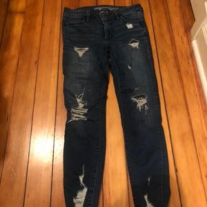 Distressed AE skinny jeans